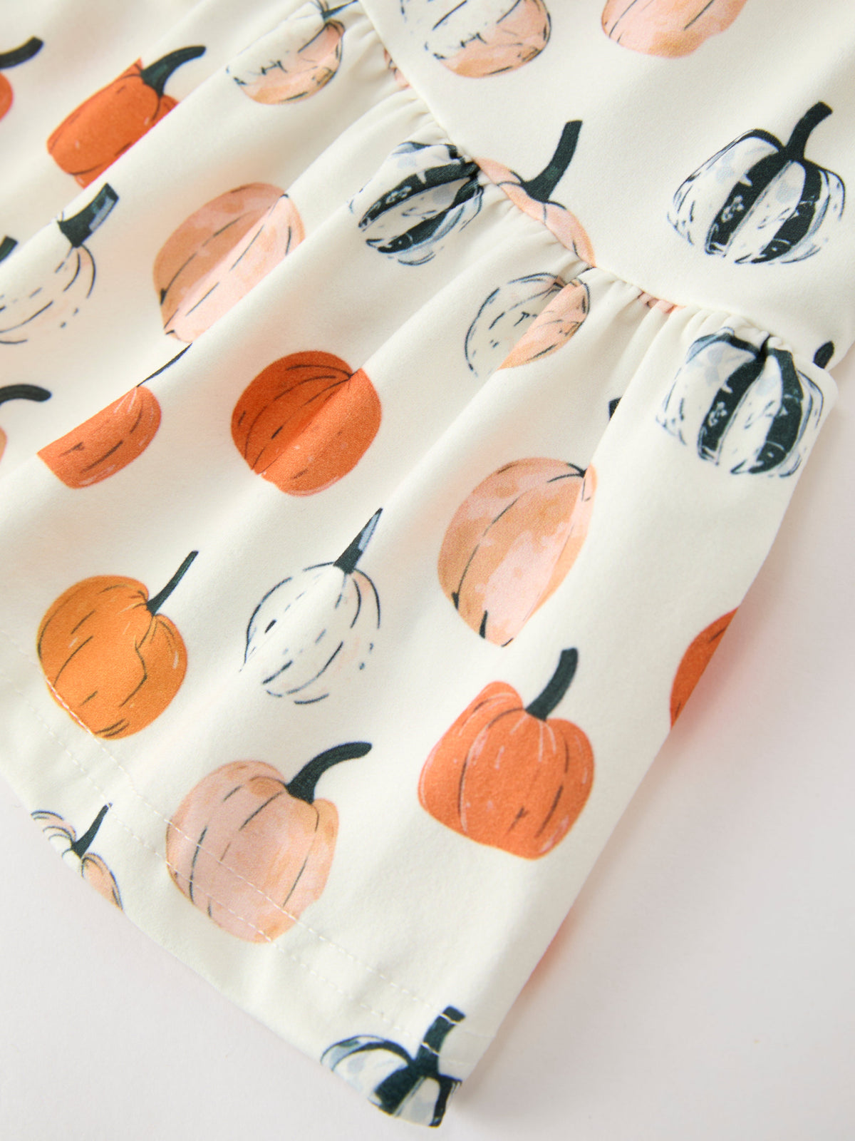 Girls Fall Dress | Pumpkin Puff Sleeves: Pumpkin print skirt close-up
