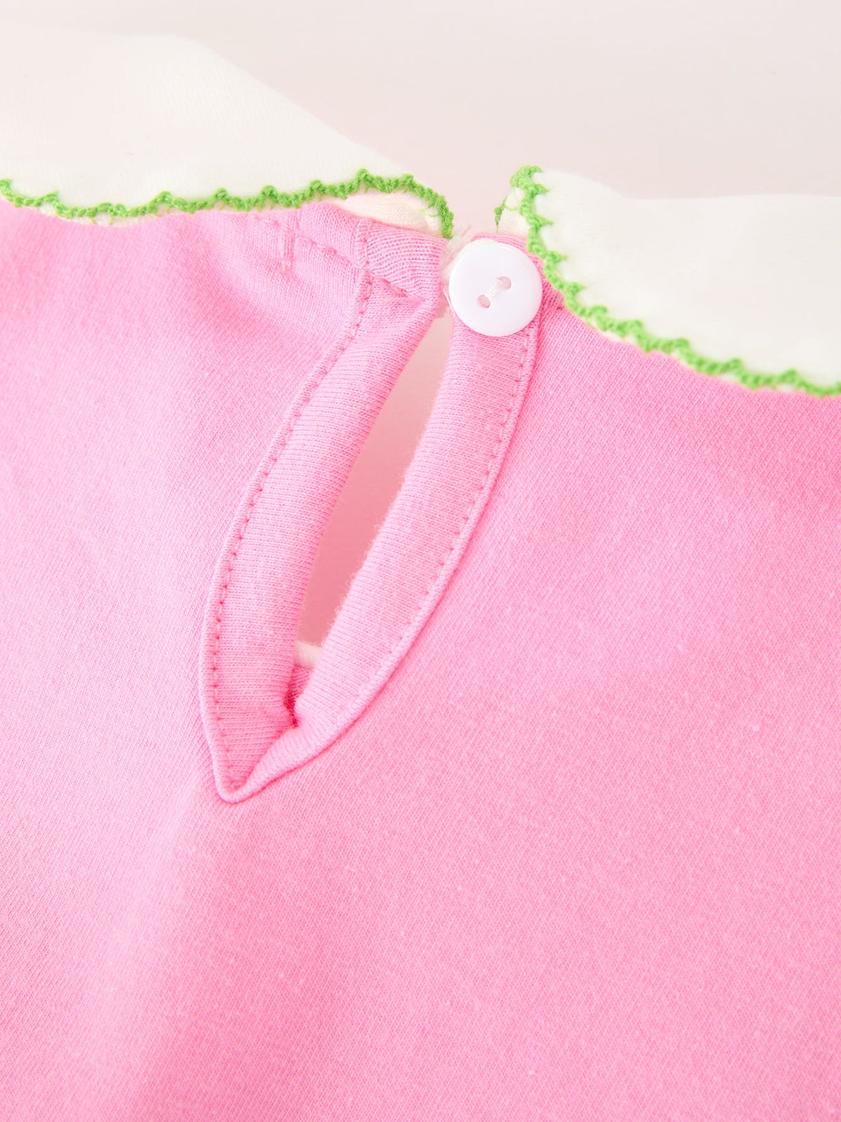 Girls Christmas Dress | Pink Tree & Bow Collar: Back button and keyhole detail