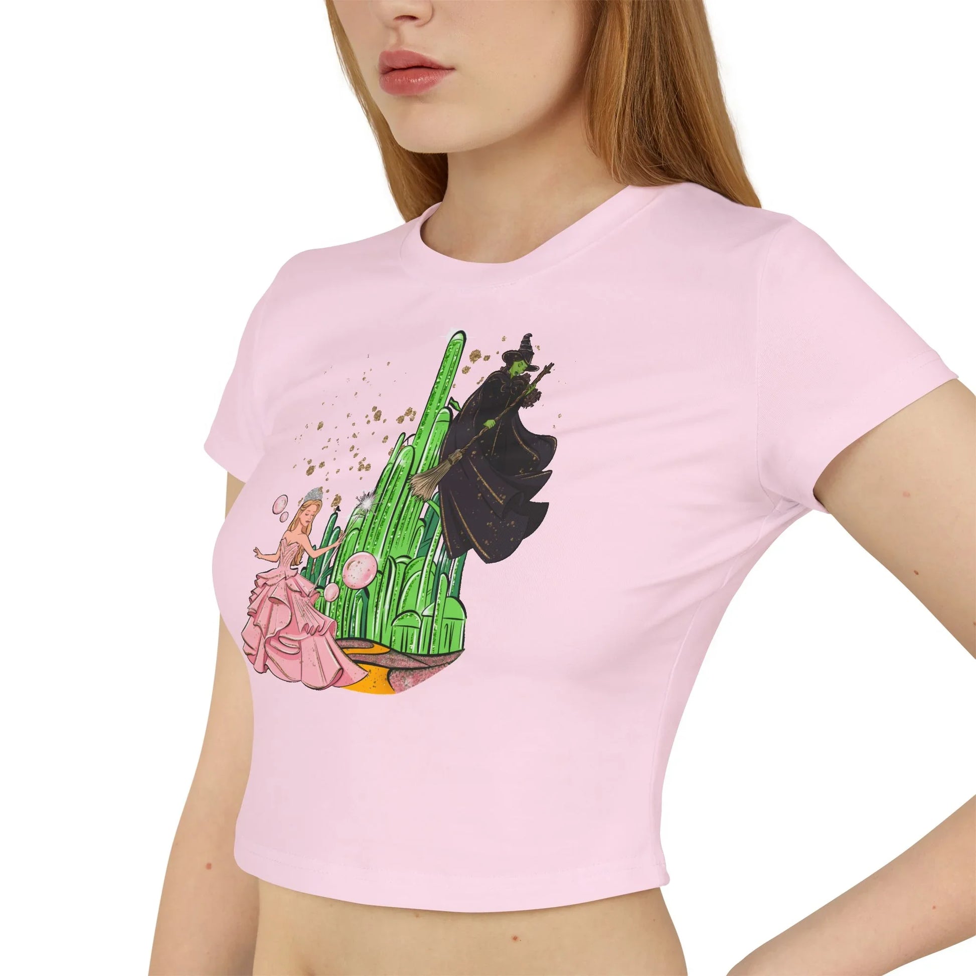 Emerald City Magic: Glinda vs. Elphaba Women's Baby Tee - Whippie's