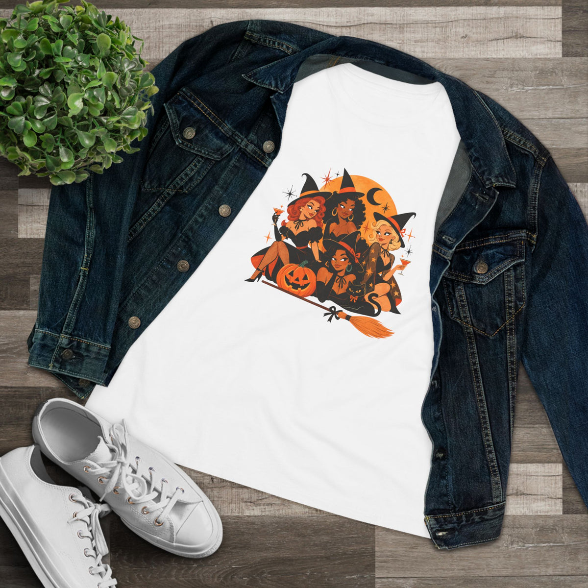 White four witches shirt styled with denim jacket and sneakers