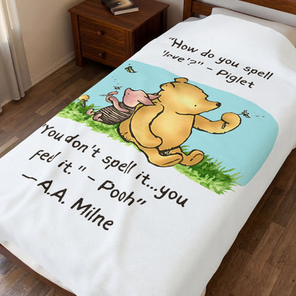 60" x 80" Blanket with Winnie the Pooh and Piglet cartoon and text on a twin bed. blanket covers the bed and slightly hangs from sides of bed.