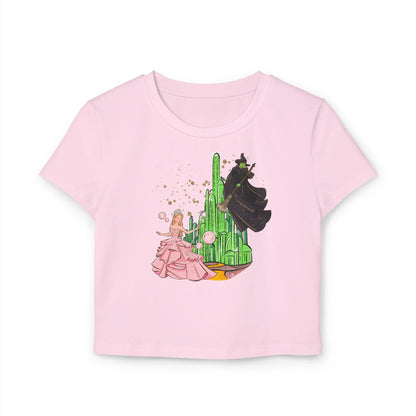 Emerald City Magic: Glinda vs. Elphaba Women's Baby Tee - Whippie's