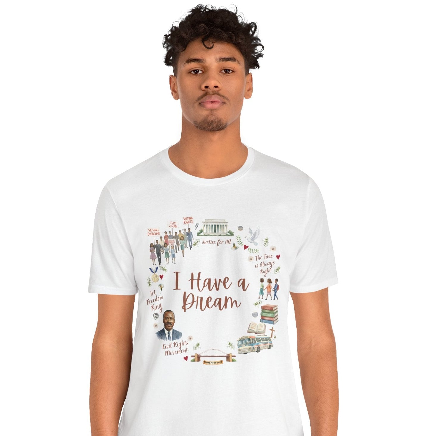 Person wearing a white t-shirt with MLK I have a Dream design on a white background