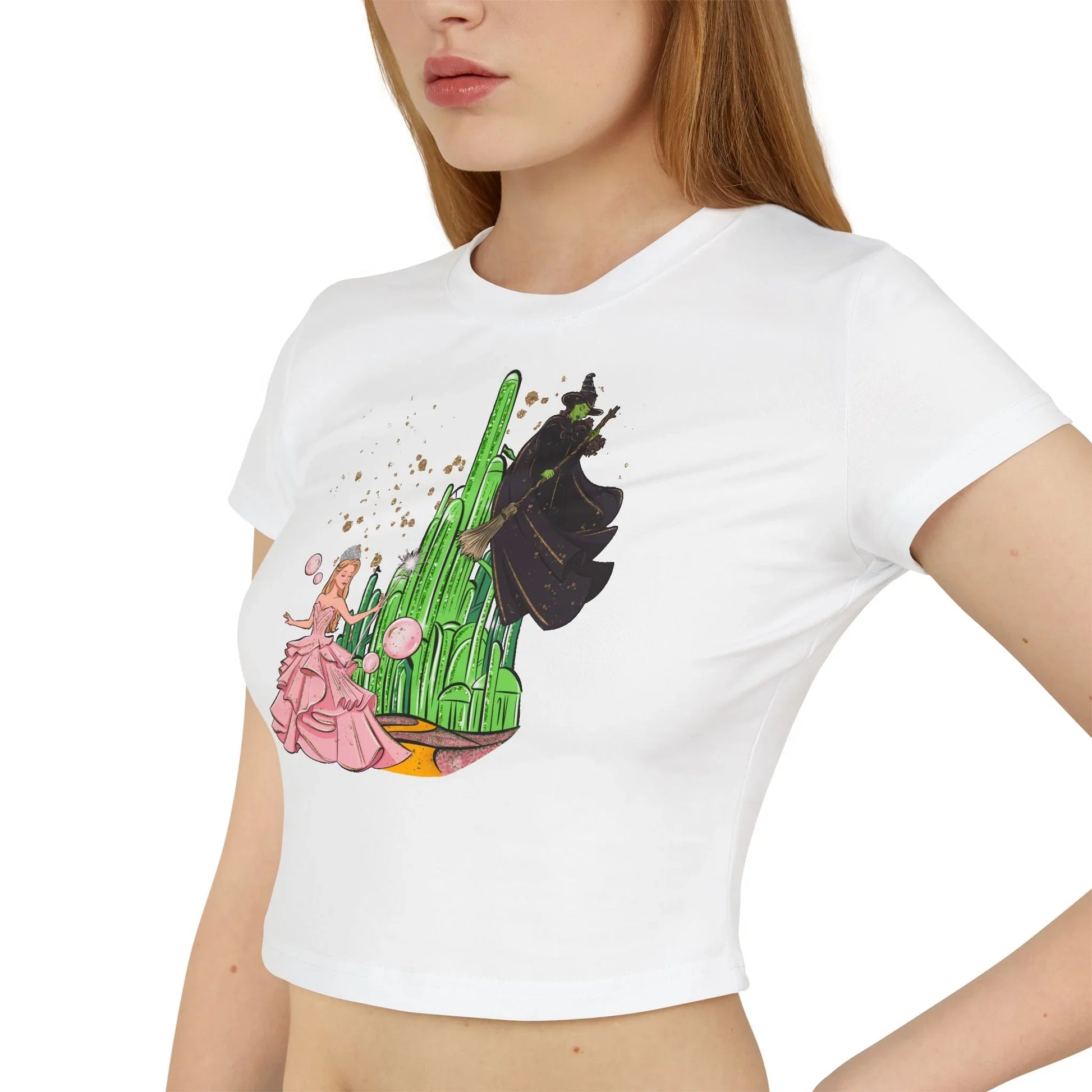 Emerald City Magic: Glinda vs. Elphaba Women's Baby Tee - Whippie's