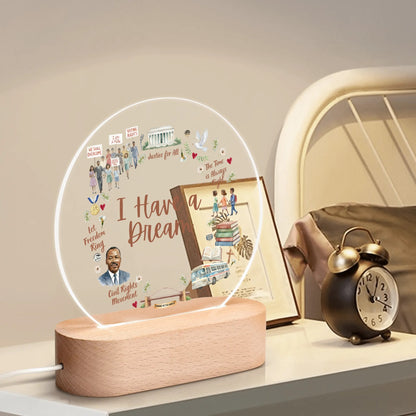 I Have a Dream night light with civil rights artwork on a wooden base, on a bedroom nightstand
