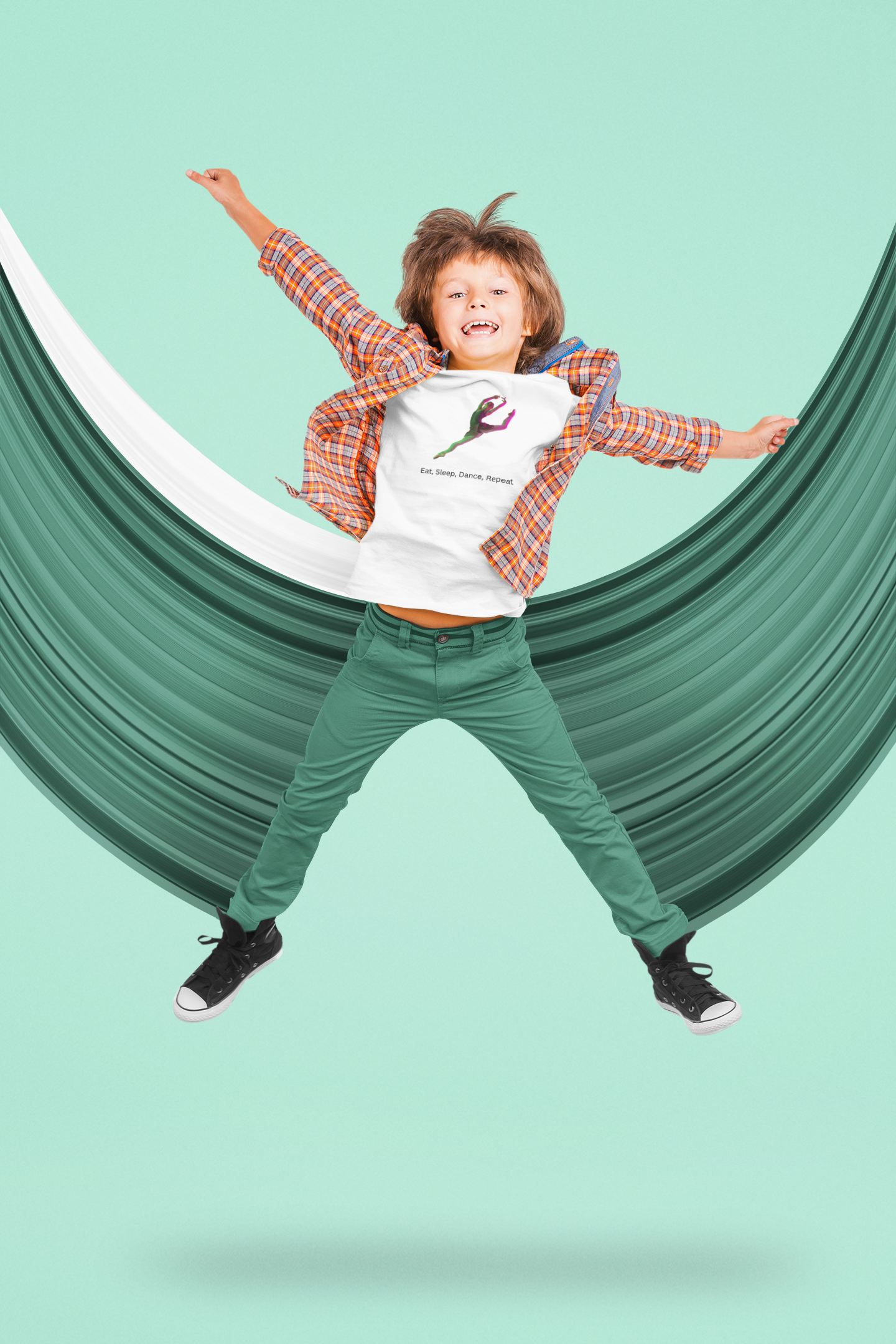 Child jumping in a green hammock against a light blue background