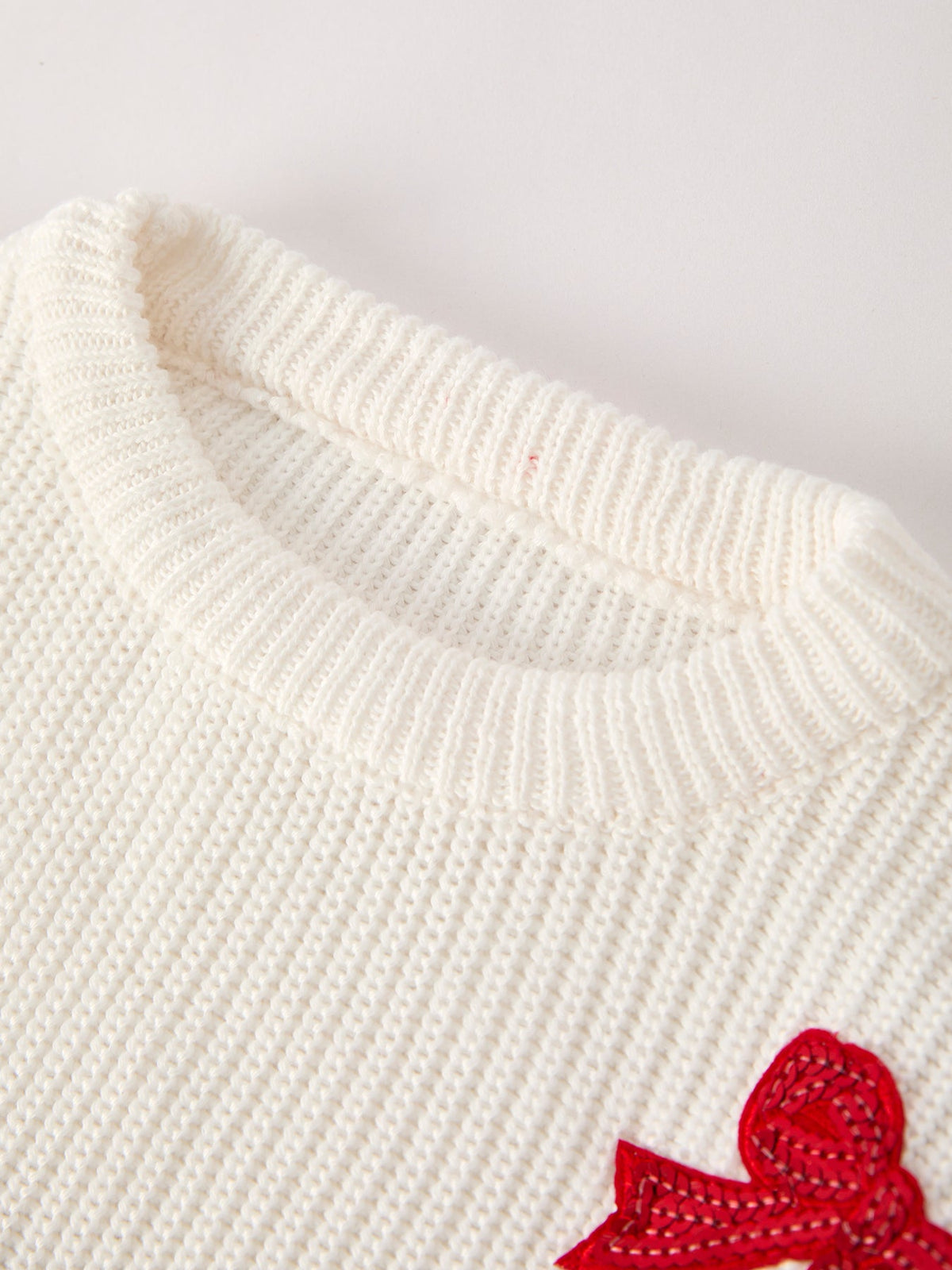 Mommy and Me Sweaters | Red Sequin Bows: Ribbed round neckline detail