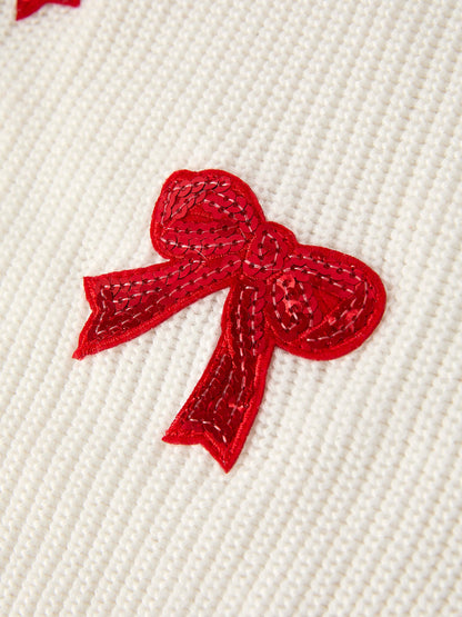 Mommy and Me Sweaters | Red Sequin Bows: Red sequin bow close-up