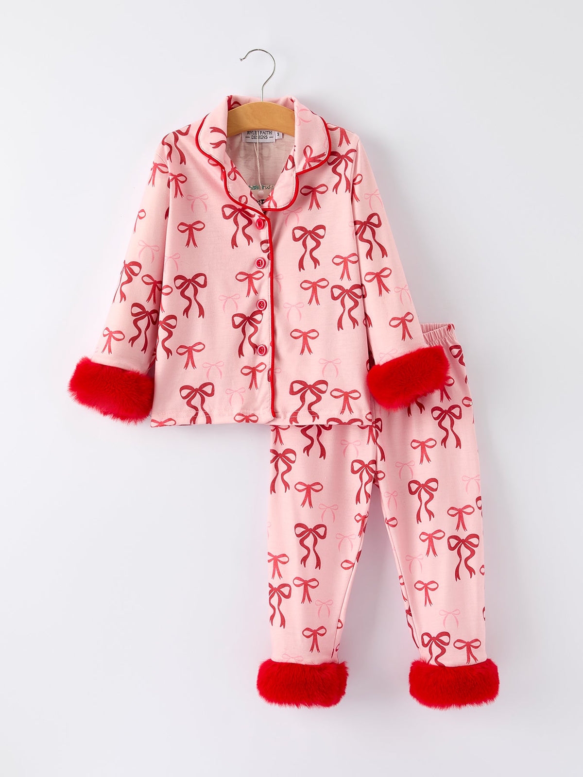 Girls Christmas Pajamas | Pink Bow Furry Trim: Front on hanger