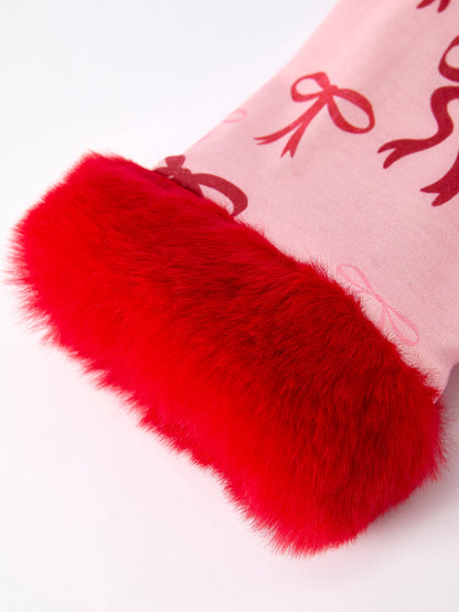 Girls Christmas Pajamas | Pink Bow Furry Trim: Red furry cuff close-up