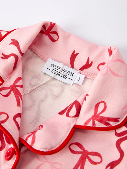 Girls Christmas Pajamas | Pink Bow Furry Trim: Collar and brand label detail