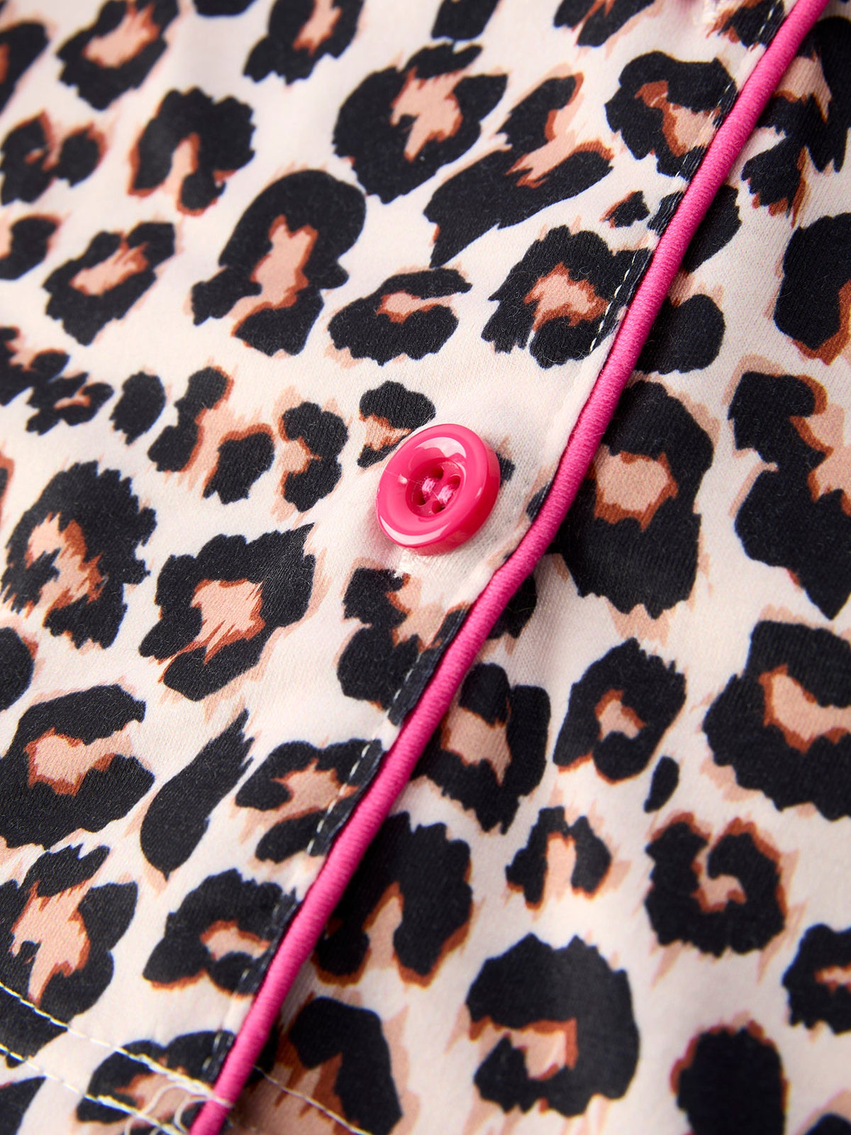 Mommy and Me Pajamas | Leopard Ruffle Shorts: Pink button and leopard print close-up