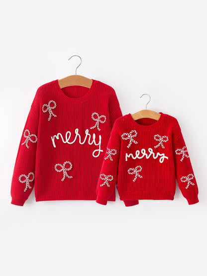 Mommy and Me Sweaters | Red Merry & Bows: Adult and child pullovers on hangers