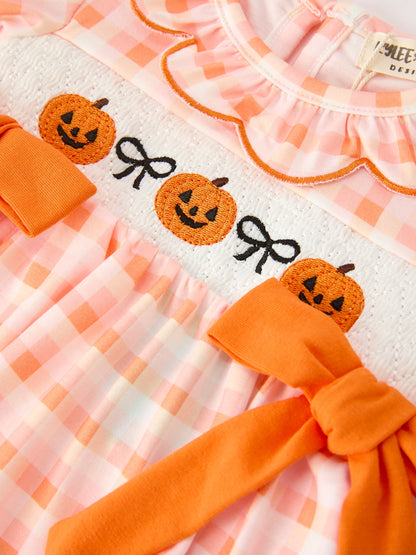Girls Halloween Outfit | Pumpkin Bloomer Set: Embroidered pumpkins and orange bow close-up