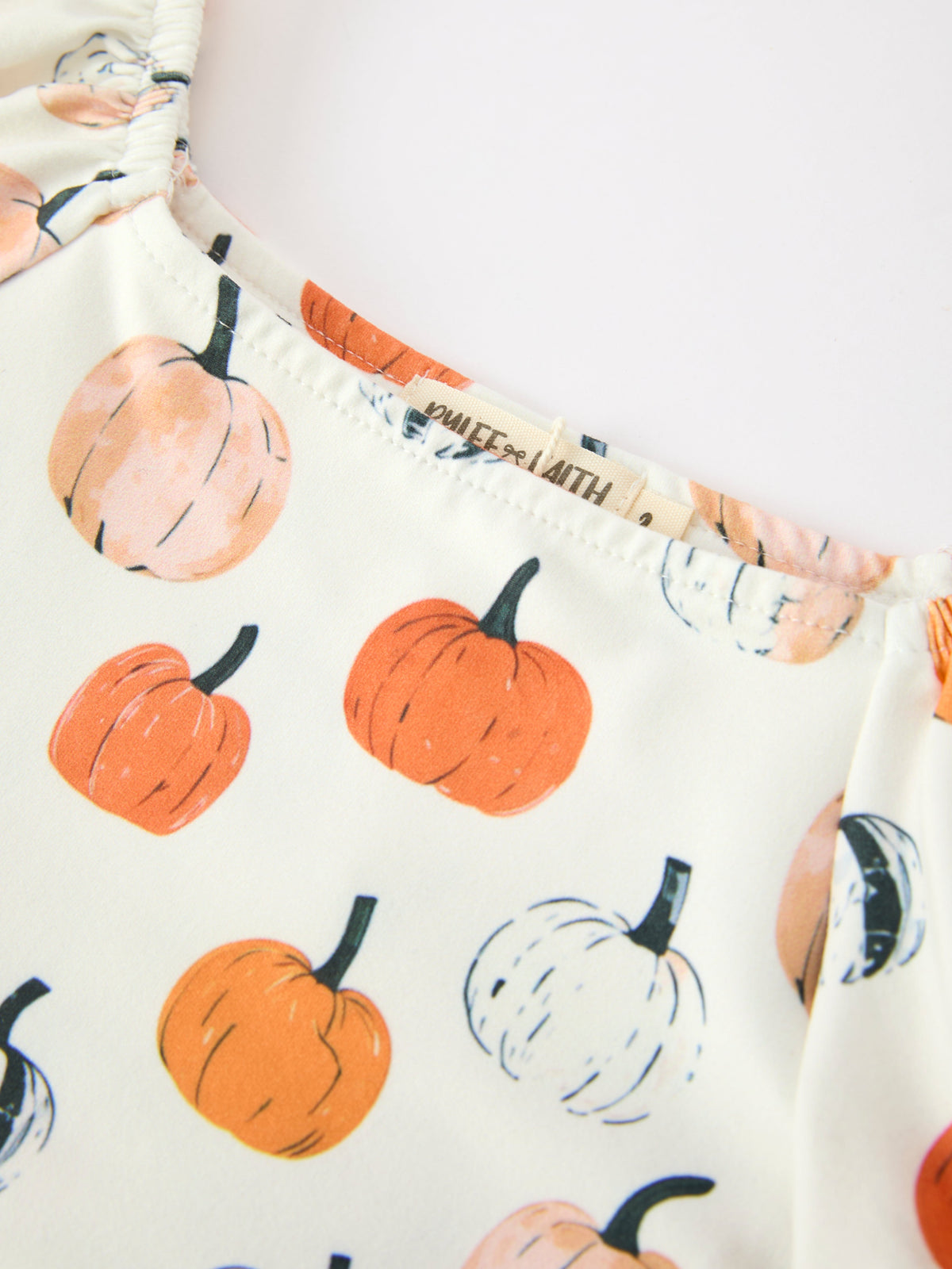 Girls Fall Dress | Pumpkin Puff Sleeves: Square neckline and brand label