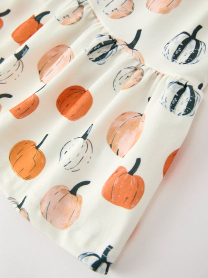 Girls Fall Dress | Pumpkin Puff Sleeves: Pumpkin print skirt close-up
