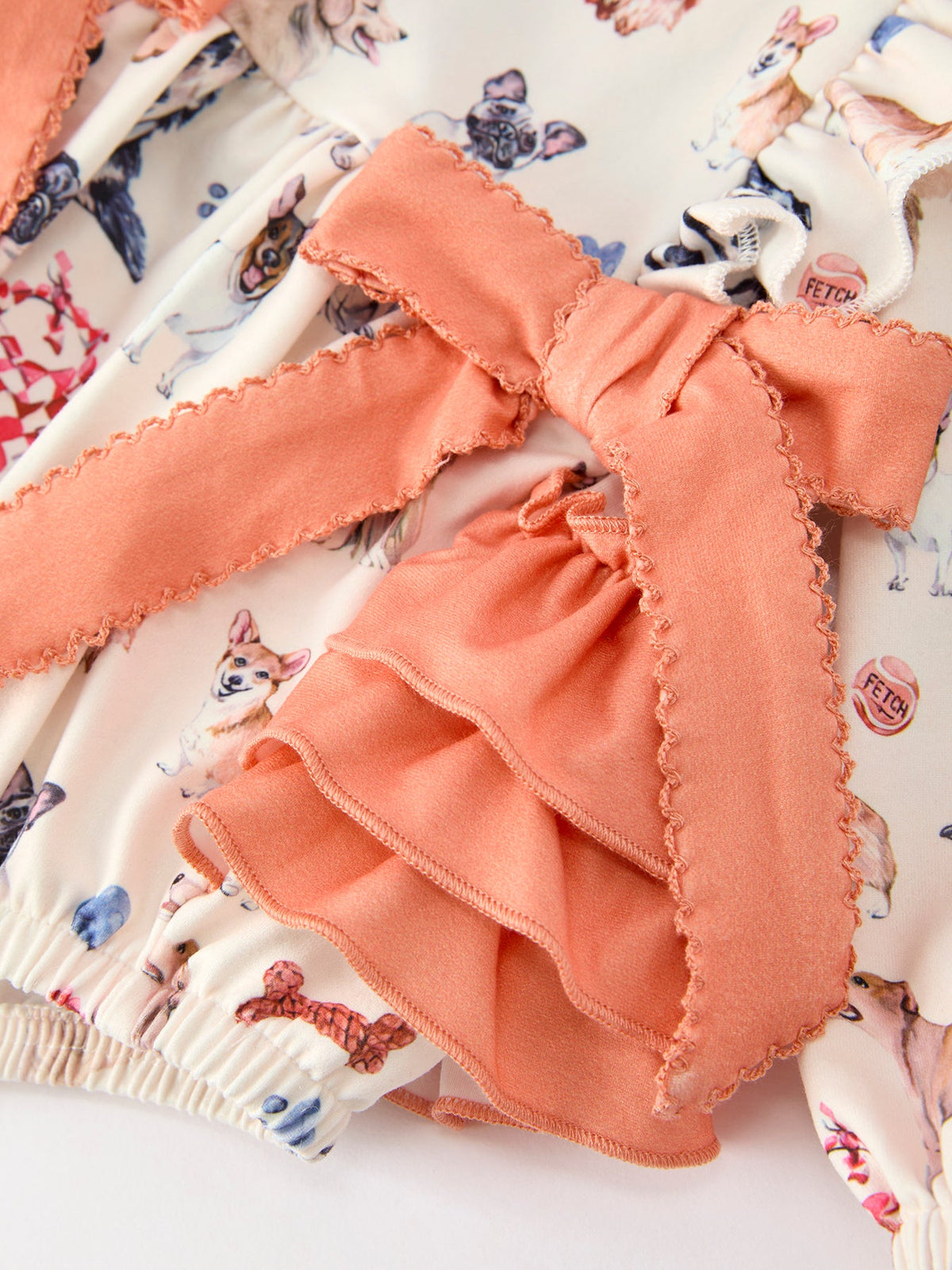 Baby Girl Romper | Fall Dogs & Ruffle Bows: Peach bow and layered ruffle detail