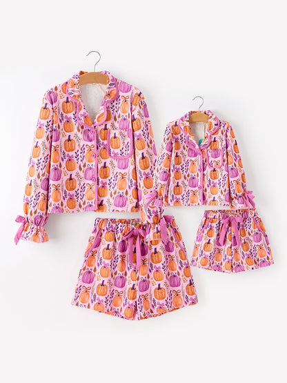 Halloween pumpkin matching pajama set for adult and child, featured product photograph
