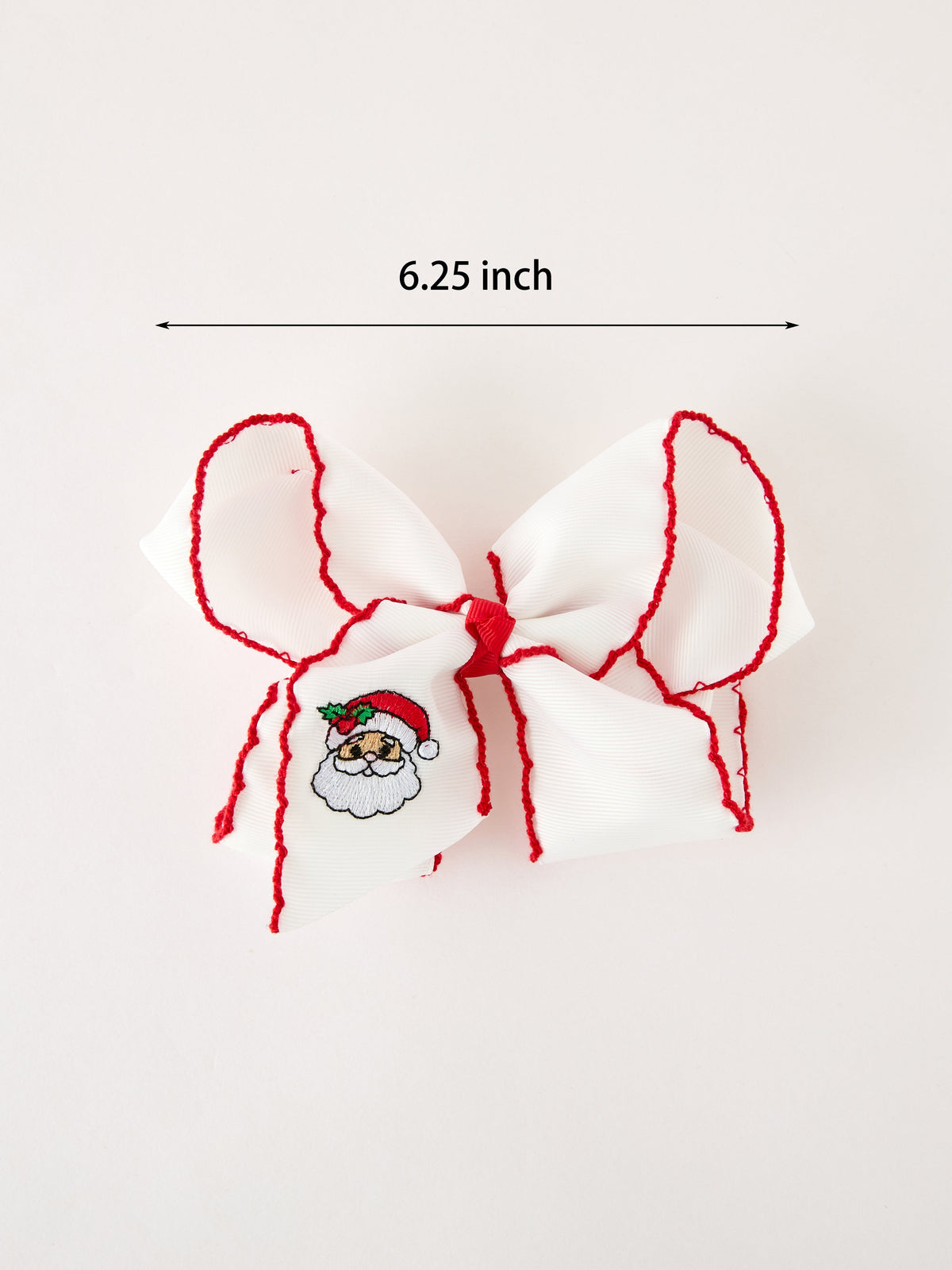 Christmas Hair Bow | Santa Embroidered 6.25 Inch: White bow showing 6.25-inch width