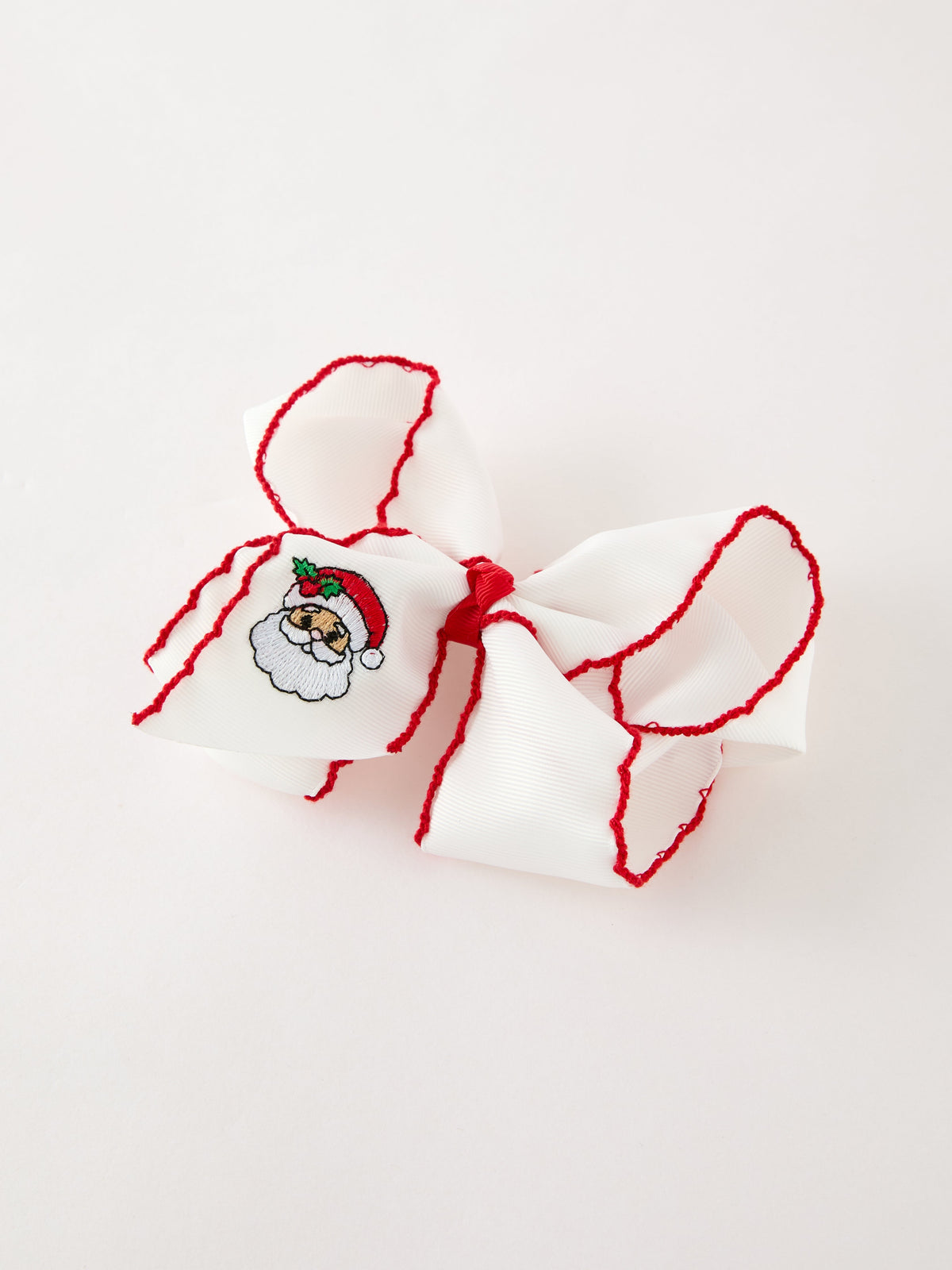 Christmas Hair Bow | Santa Embroidered 6.25 Inch: White bow angled view