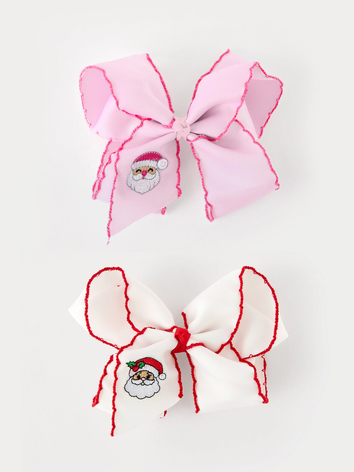 Christmas Hair Bow | Santa Embroidered 6.25 Inch: White and pink embroidered Santa bows