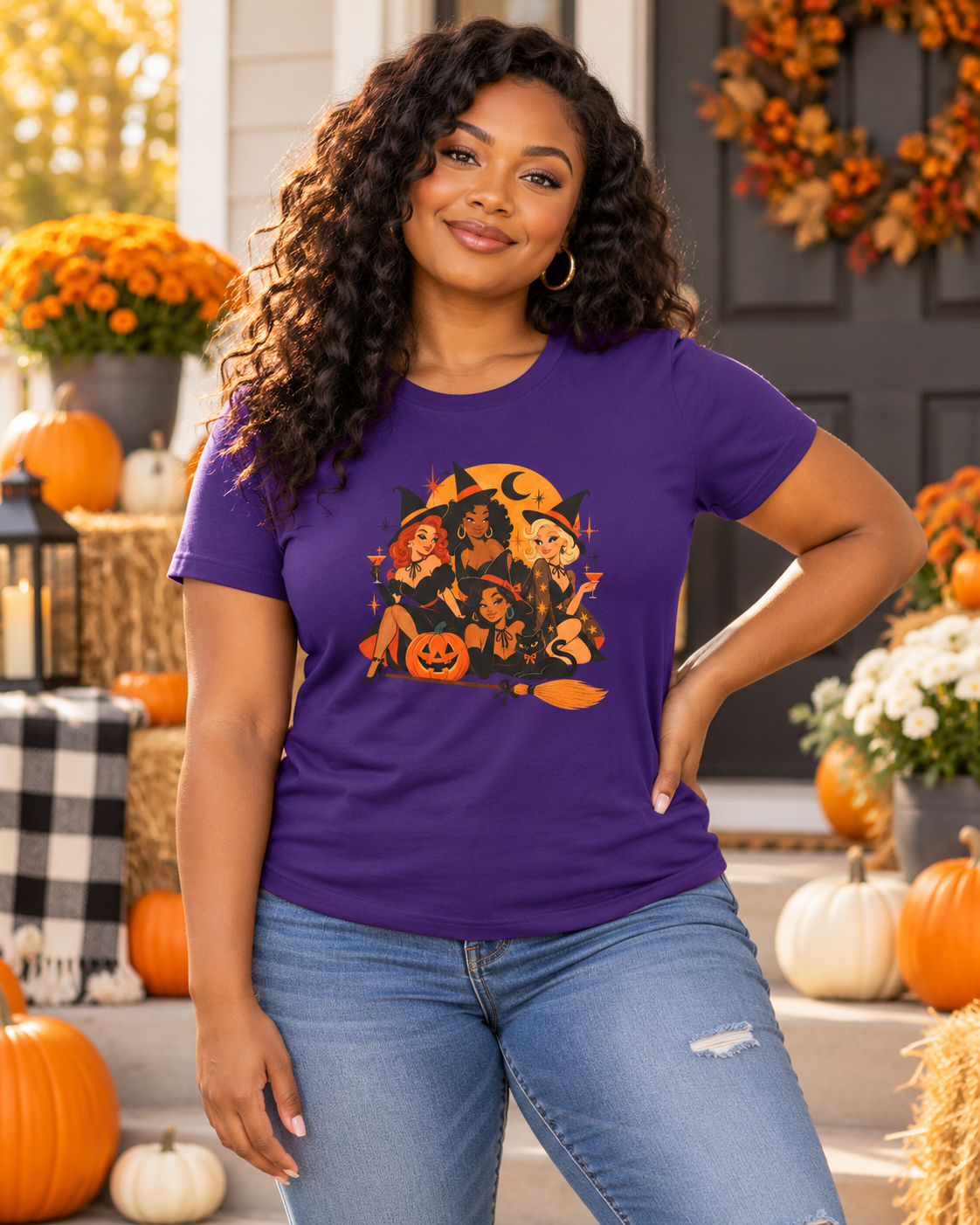 Woman in purple Charmed and Chic Coven Halloween shirt on autumn porch