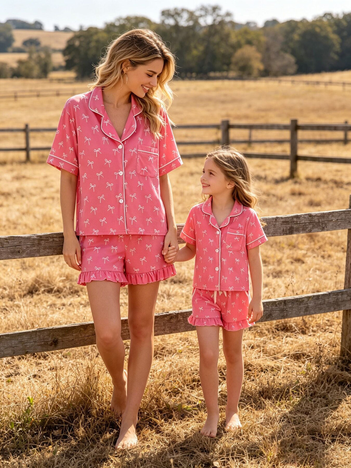 Mommy and Me Pajamas | Pink Bow Ruffle Shorts: Adult and child wearing pink bow shorts sets