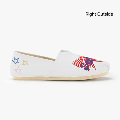 White shoes with red, white, and blue America text and red and white strip bow designs - right outside of shoe