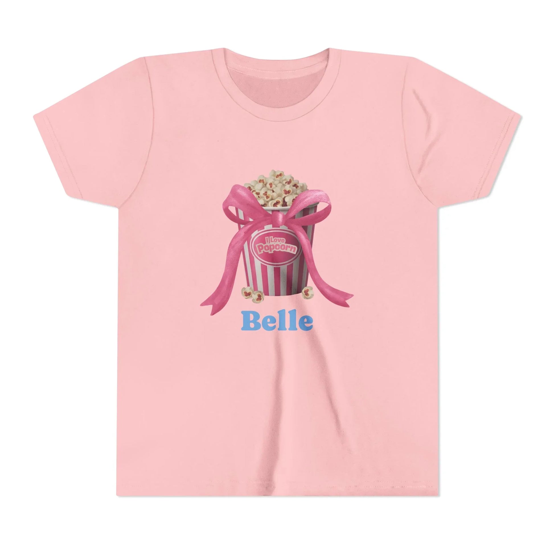 Pink t-shirt with popcorn bucket graphic tied with pink ribbon and blue text Belle