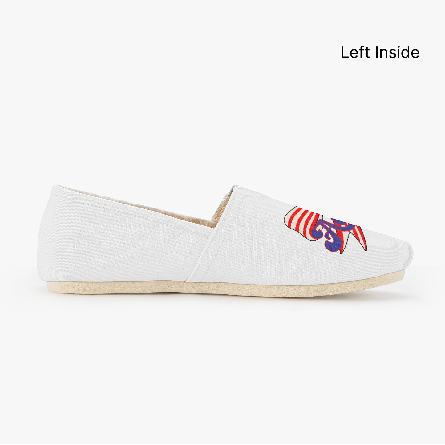 White shoes with red, white, and blue America text and red and white strip bow designs - Left inside of shoe
