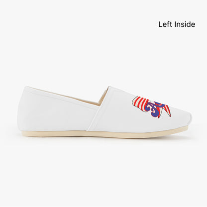 White shoes with red, white, and blue America text and red and white strip bow designs - Left inside of shoe