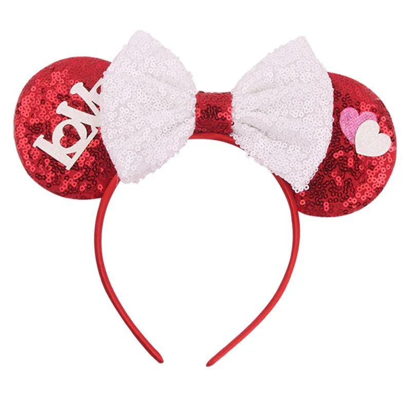 Red sequin Minnie Mouse ears headband with white sequin bow and heart decorations