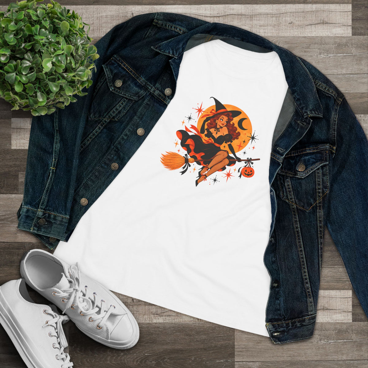 White flying witch shirt styled with denim jacket and sneakers