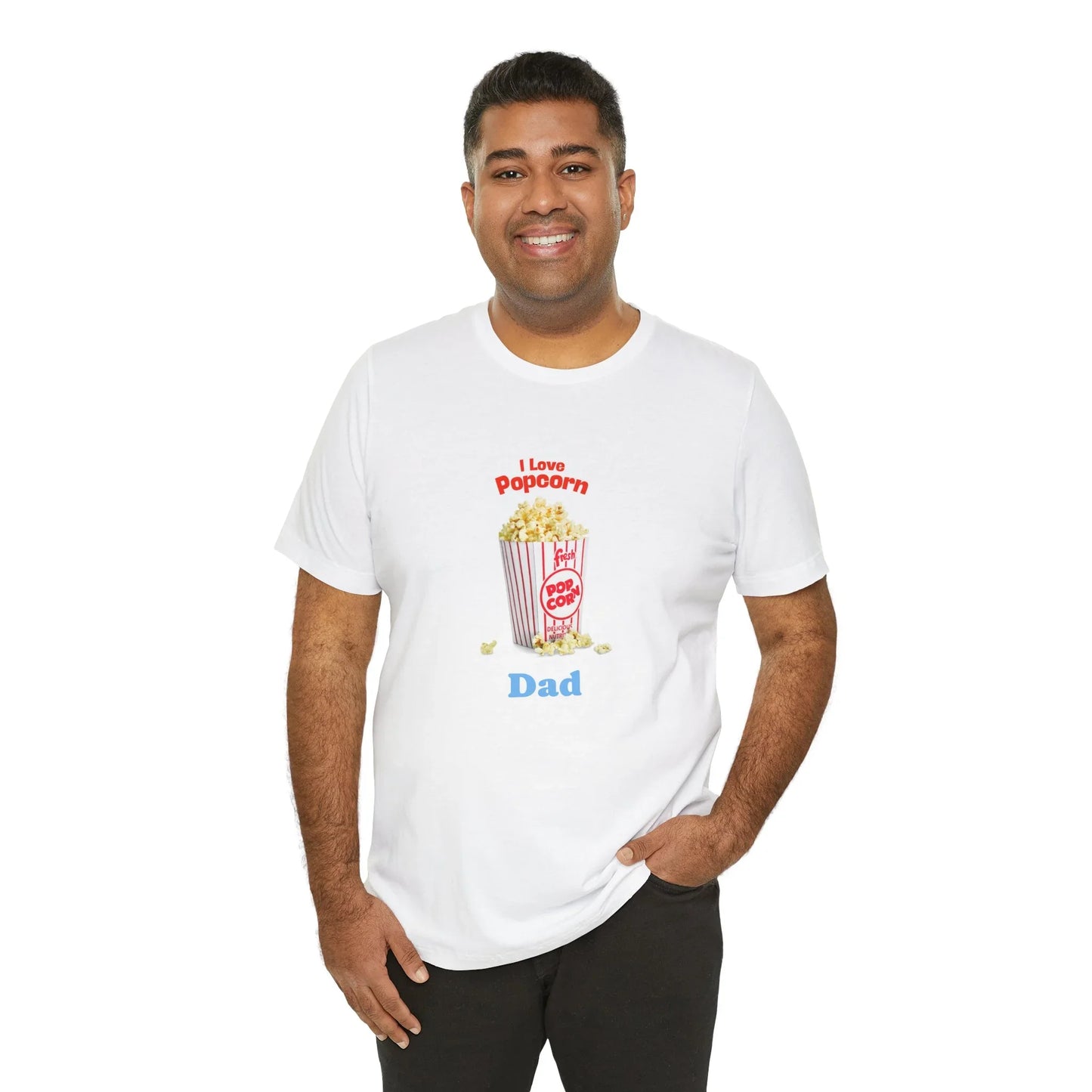 Smiling man wearing white t-shirt with I Love Popcorn Dad graphic and popcorn illustration
