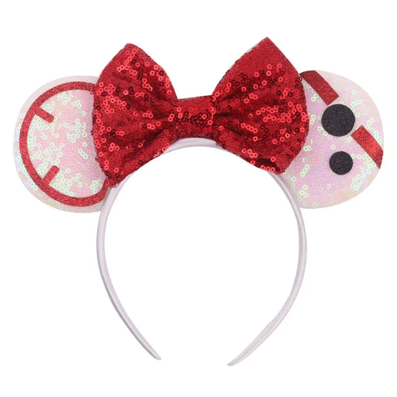 White headband with red sequined bow and white sequin ears featuring BB-8 Star Wars design