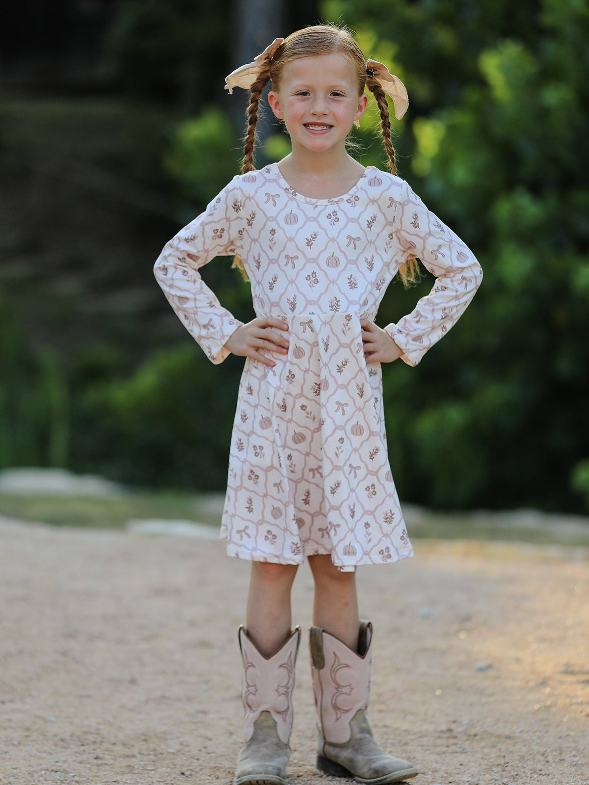 Girls Fall Dress | Pumpkin Bow Twirl: Model with hands on hips