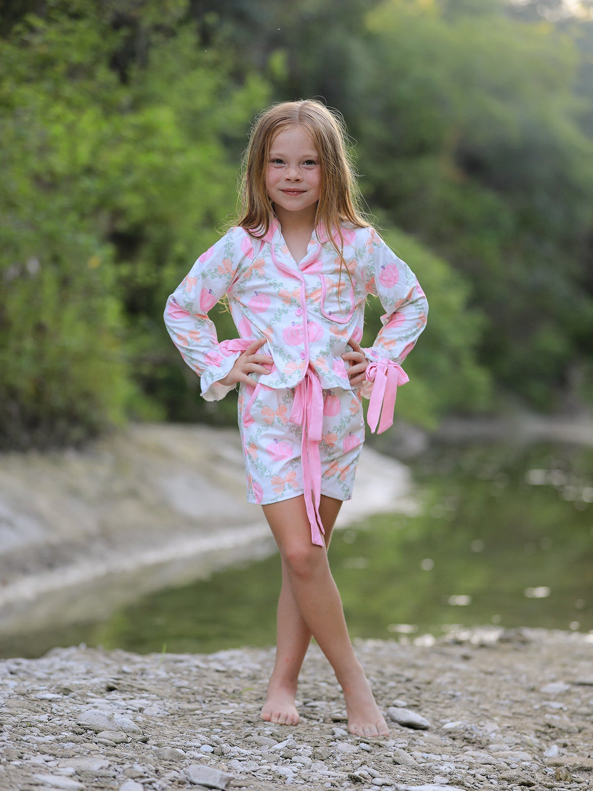 Mommy and Me Pajamas | Pumpkin Floral Shorts: Child showing front fit outdoors