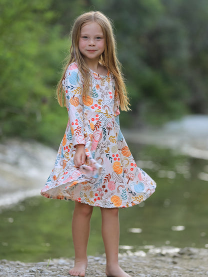 Girls Fall Dress | Pumpkin & Leaf Print: Model showing front fit