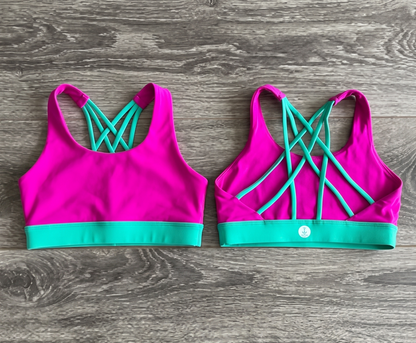 mockup of  horizon girls dancewear hot pink top with teal cross straps front and back