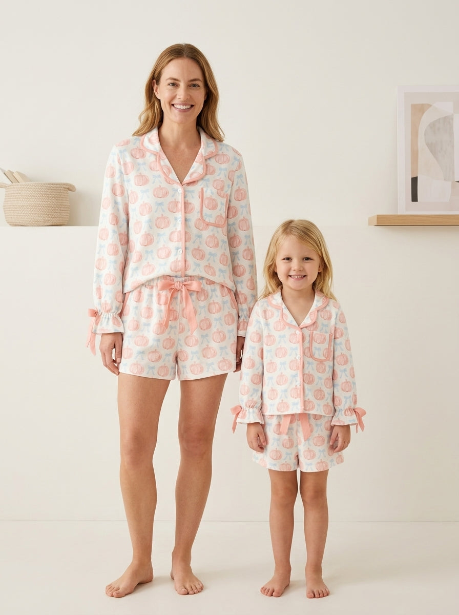 Mommy and Me Pajamas | Pastel Pumpkin Shorts: Adult and child modeling pastel pumpkin shorts sets