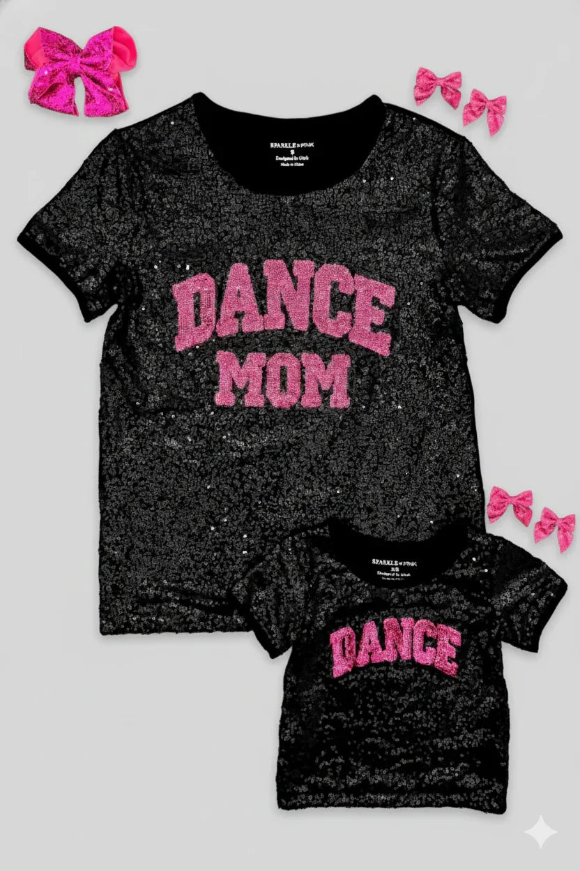 Black glittery t-shirt with 'DANCE MOM' and matching smaller t-shirt with 'DANCE' on a light gray background.