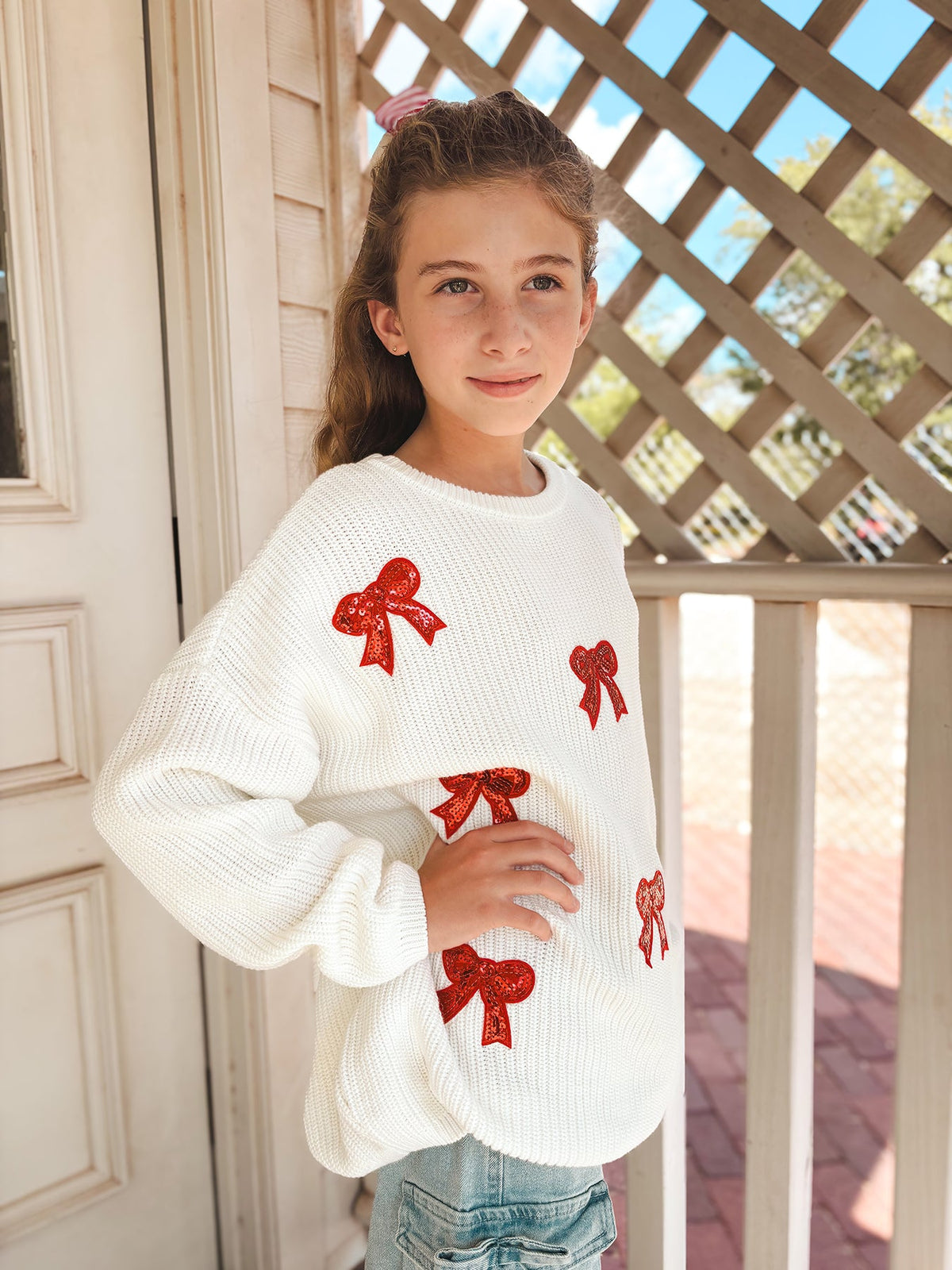 Mommy and Me Sweaters | Red Sequin Bows: Child showing front fit