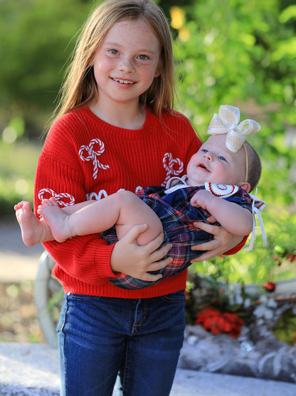 Mommy and Me Sweaters | Red Merry & Bows: Child sweater beside baby in separate matching romper