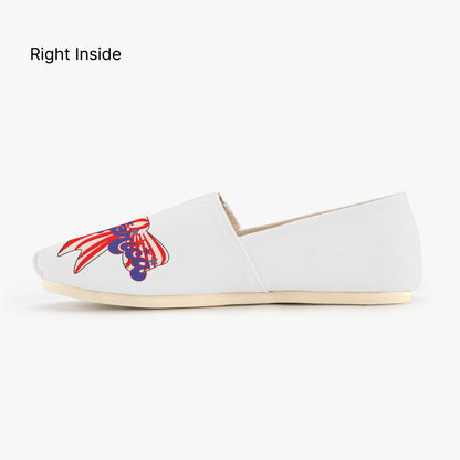White shoes with red, white, and blue America text and red and white strip bow designs - right inside of shoe design