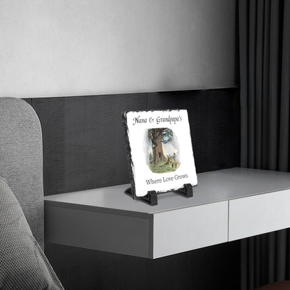 Nana & Granpapa' s Where Love Grows Classic Pooh Slate Sign  on a nightstand