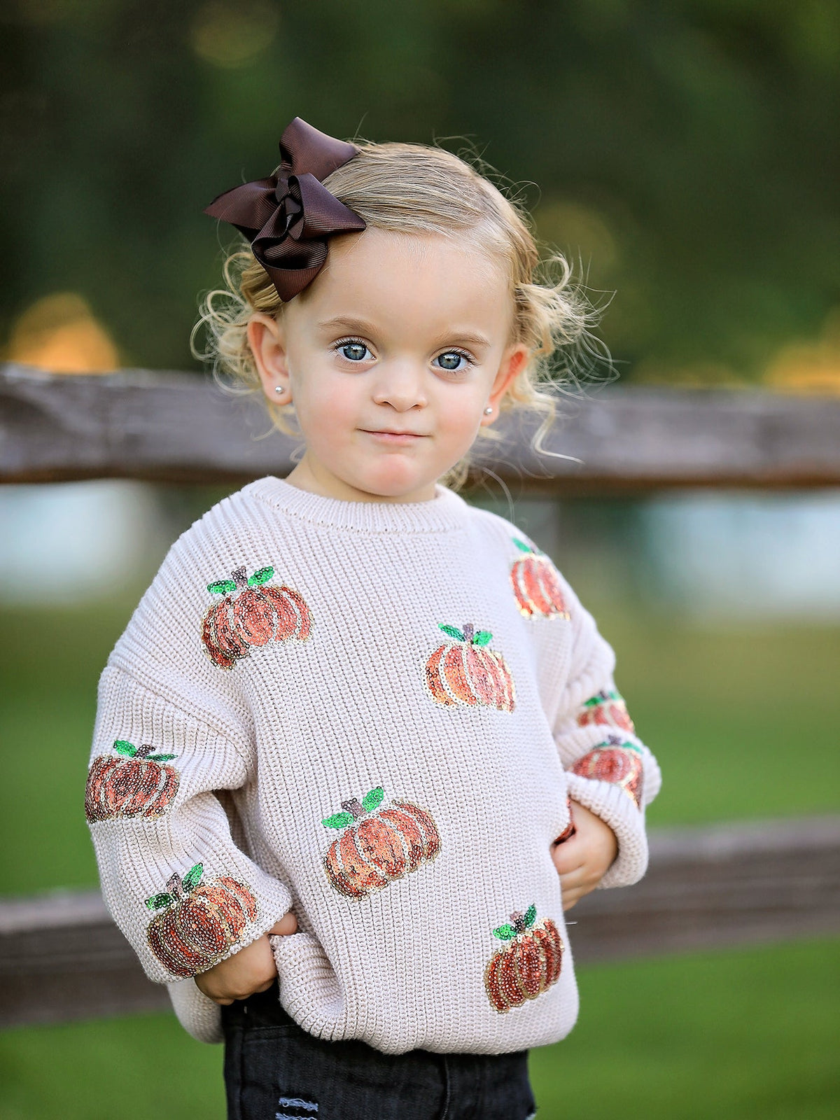 Girls Fall Sweater | Beige Sequin Pumpkins: Model posing with hand on hip