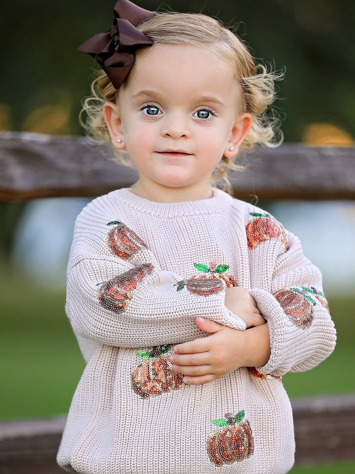 Girls Fall Sweater | Beige Sequin Pumpkins: Model showing long sleeves