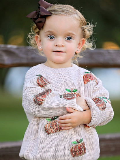 Girls Fall Sweater | Beige Sequin Pumpkins: Model showing long sleeves