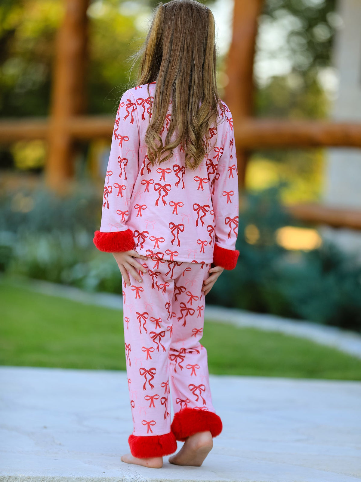 Girls Christmas Pajamas | Pink Bow Furry Trim: Back modeled view