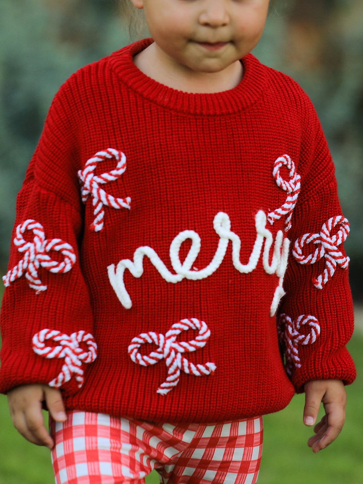 Mommy and Me Sweaters | Red Merry & Bows: Toddler wearing sweater with plaid pants